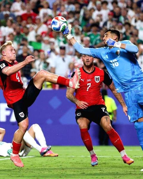 Riyad Mahrez celebrates after scoring Algeria's third goal against Austria in the 2026 FIFA World Cup Group J match at Arrowhead Stadium Kansas City