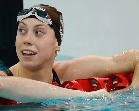 Gretchen Walsh touches the wall after breaking the women's 50-meter freestyle world record at the Sette Colli Trophy in Rome
