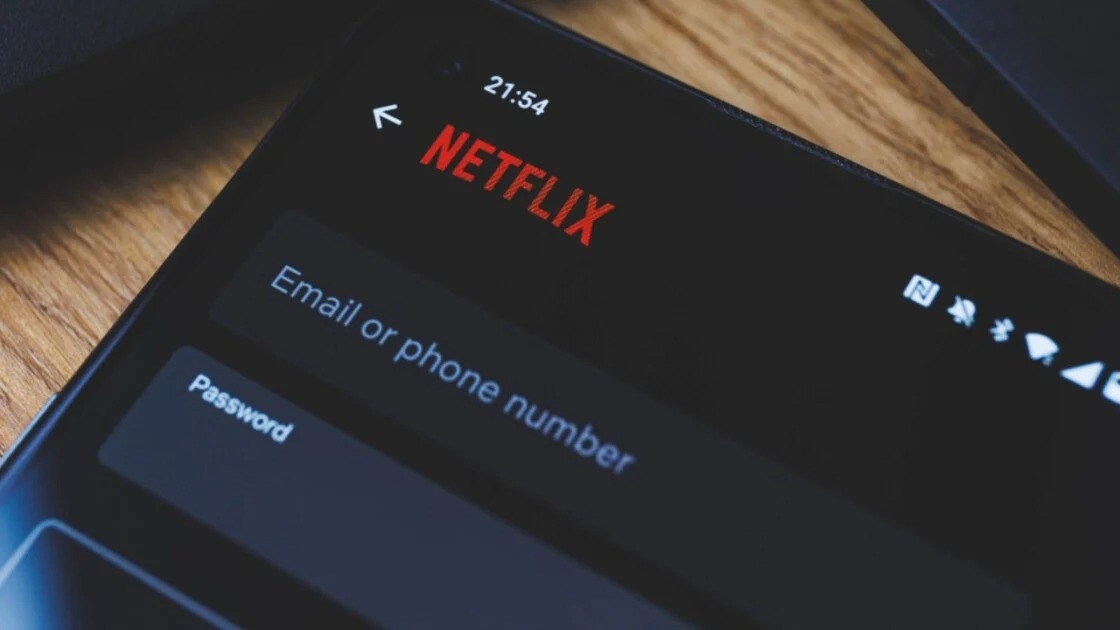 Netflix profile selection screen showing multiple household user profiles on a smart TV