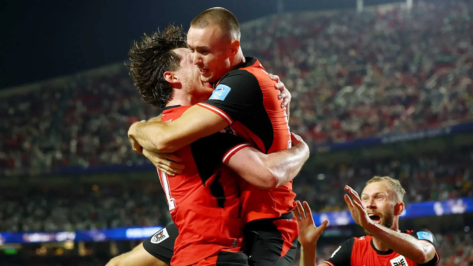 Sasa Kalajdzic heads home Austria's equalizer in the 96th minute to send both teams through at the 2026 FIFA World Cup in Kansas City
