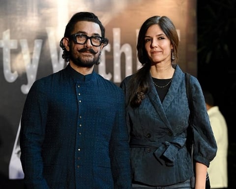 Aamir Khan with Gauri Spratt, whom he will marry on July 5, at an industry event in Mumbai in January