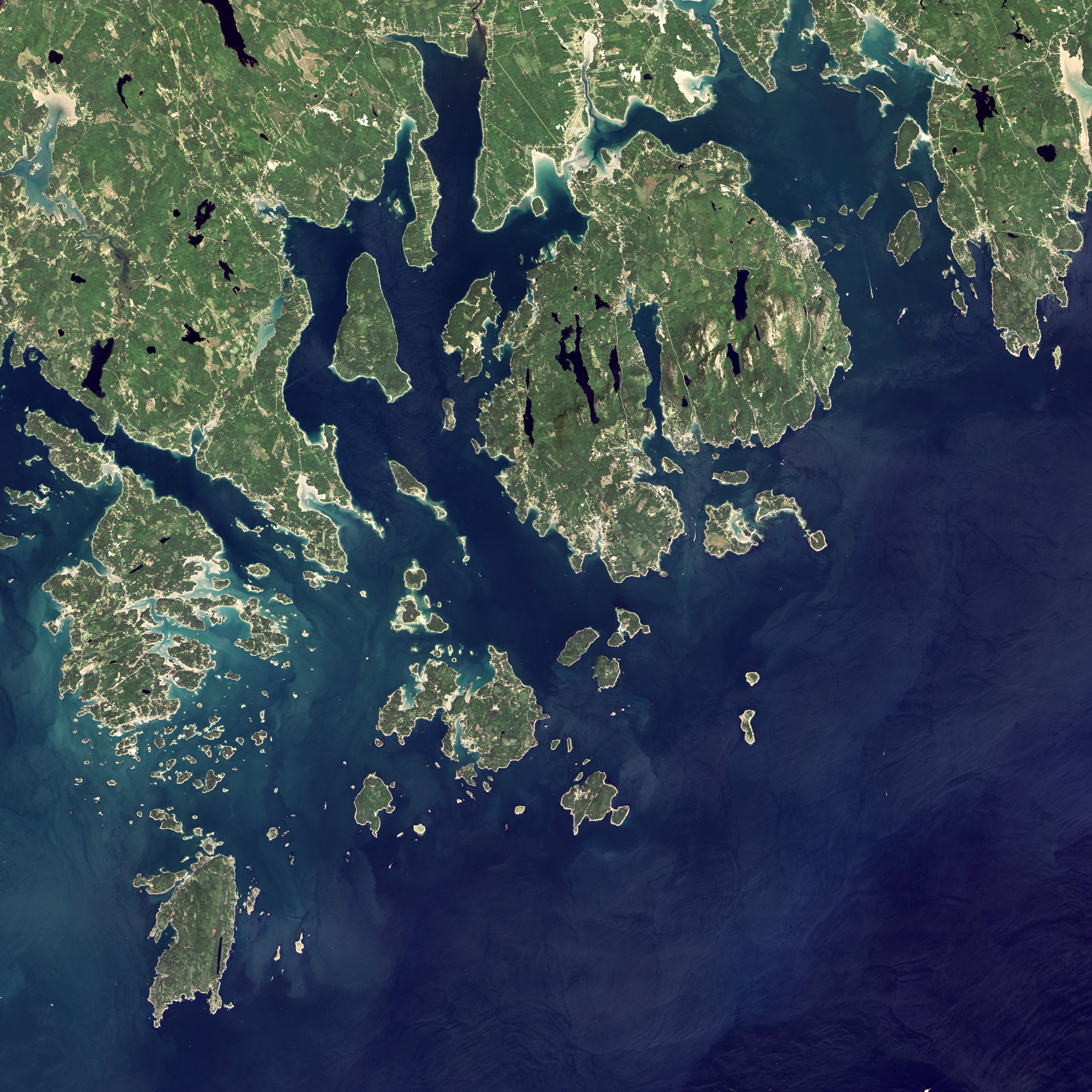 NASA Landsat satellite view of Acadia National Park in Maine, where climate-change signage was removed under a Trump executive order and ordered restored