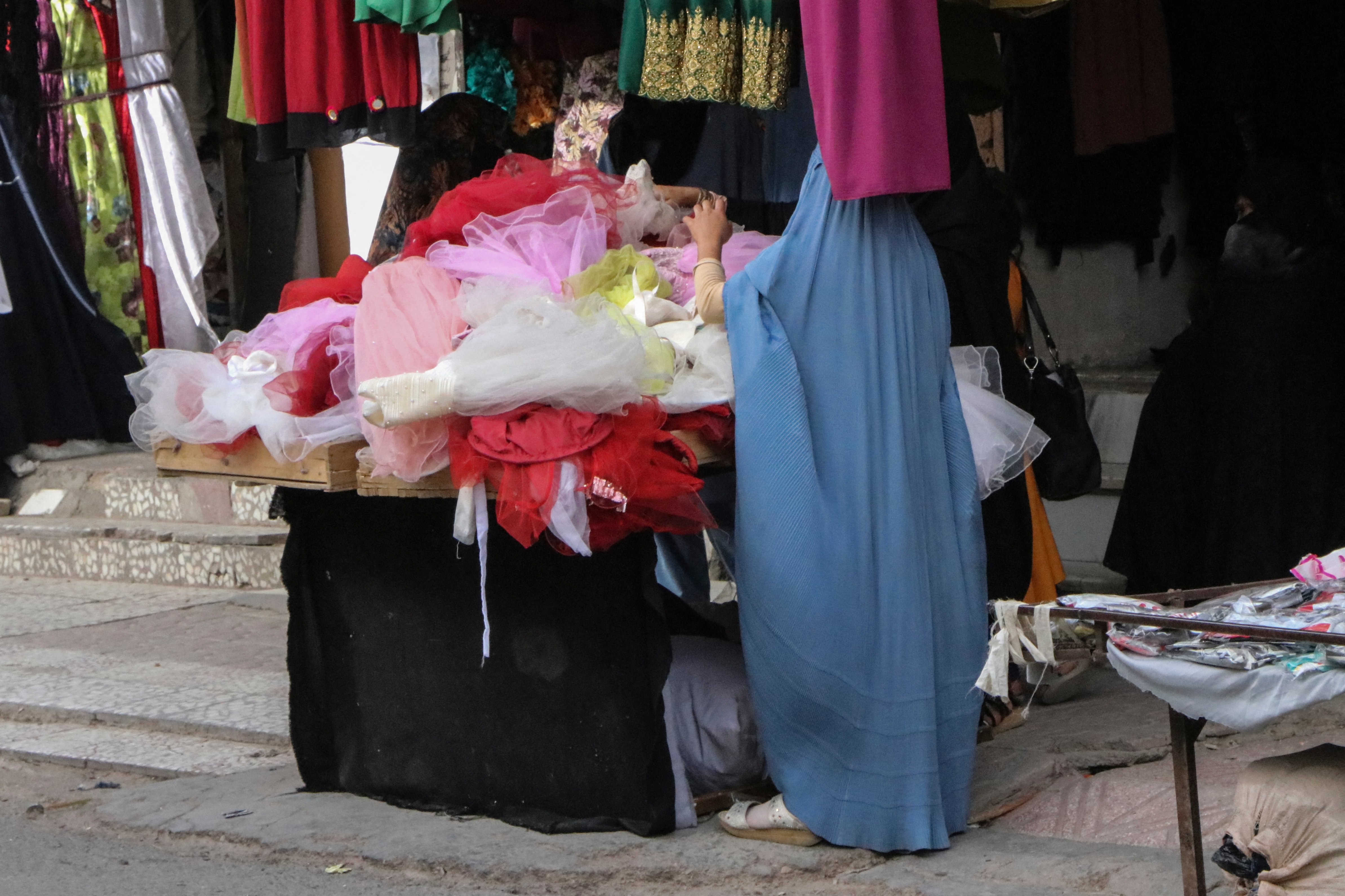 A burqa-clad woman in Herat as Taliban enforces mandatory dress code for women in Afghanistan