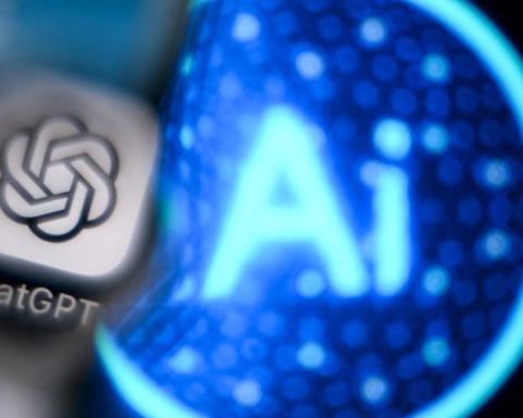 A figure at a computer amid digital data, illustrating AI agents reshaping office work