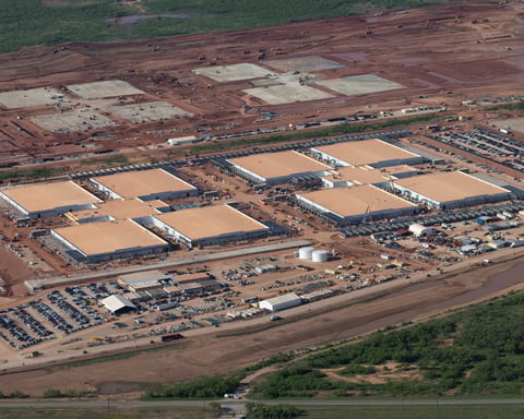 Aerial view of construction under way on a large AI data center infrastructure site