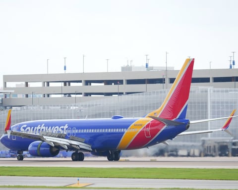 A passenger jet on approach as global airlines face a 70 percent jet fuel cost surge in 2026