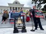 Abraham Bonowitz of Death Penalty Action leads a demonstration against the death penalty in Montgomery, Alabama