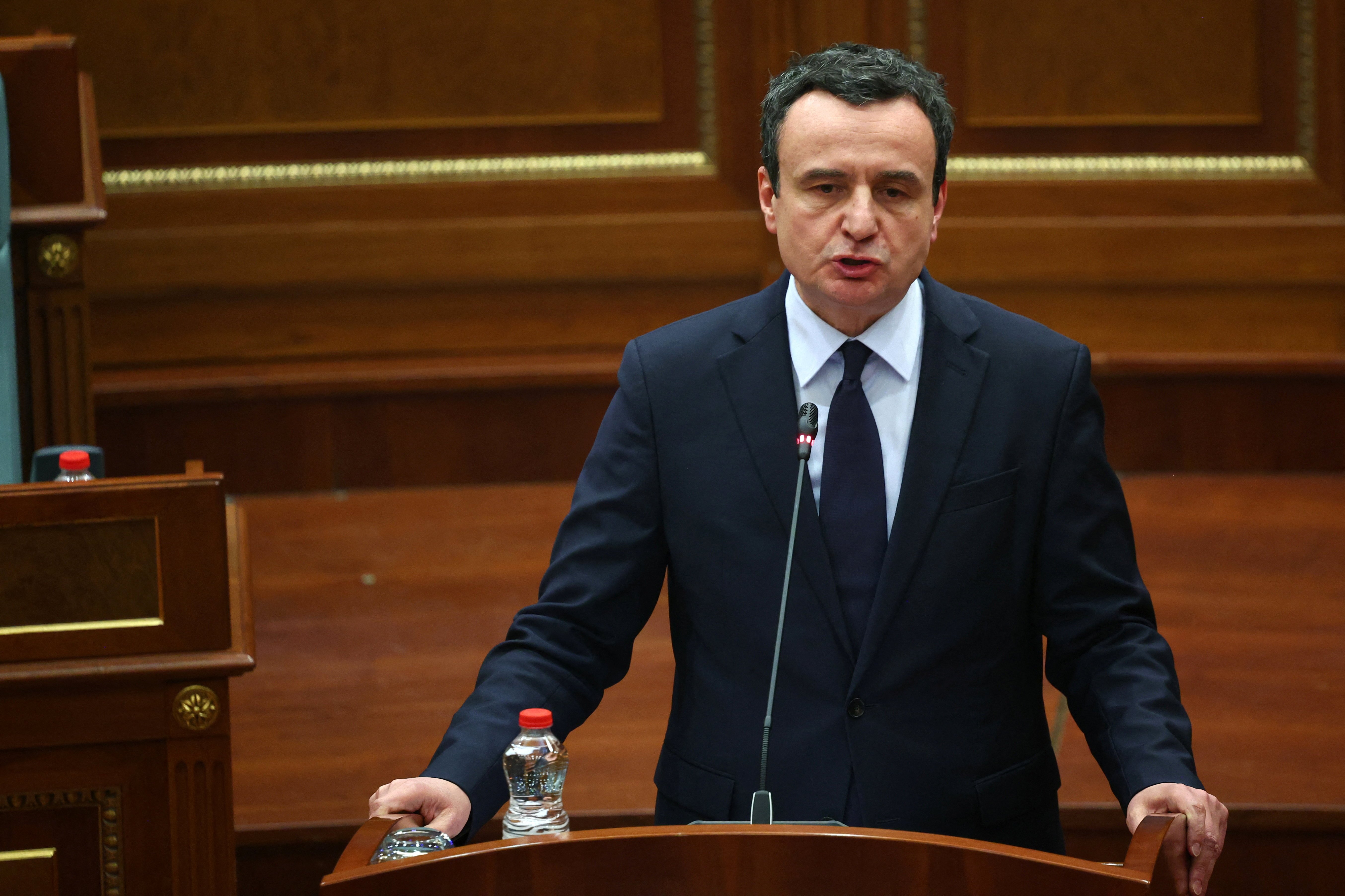 Kosovo Prime Minister Albin Kurti delivers a speech during a parliamentary session in Pristina