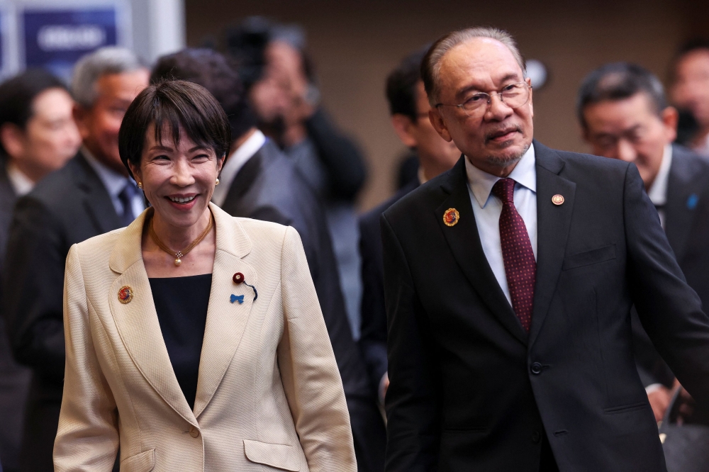 Anwar Ibrahim and Sanae Takaichi at ASEAN Summit Kuala Lumpur 2025