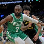Jaylen Brown drives to the basket during an NBA game for the Boston Celtics