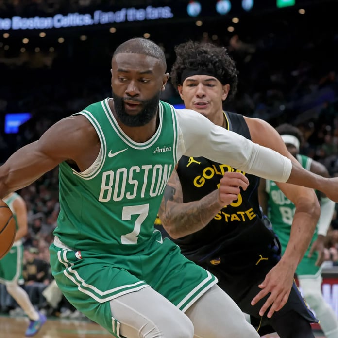 Jaylen Brown drives to the basket during an NBA game for the Boston Celtics
