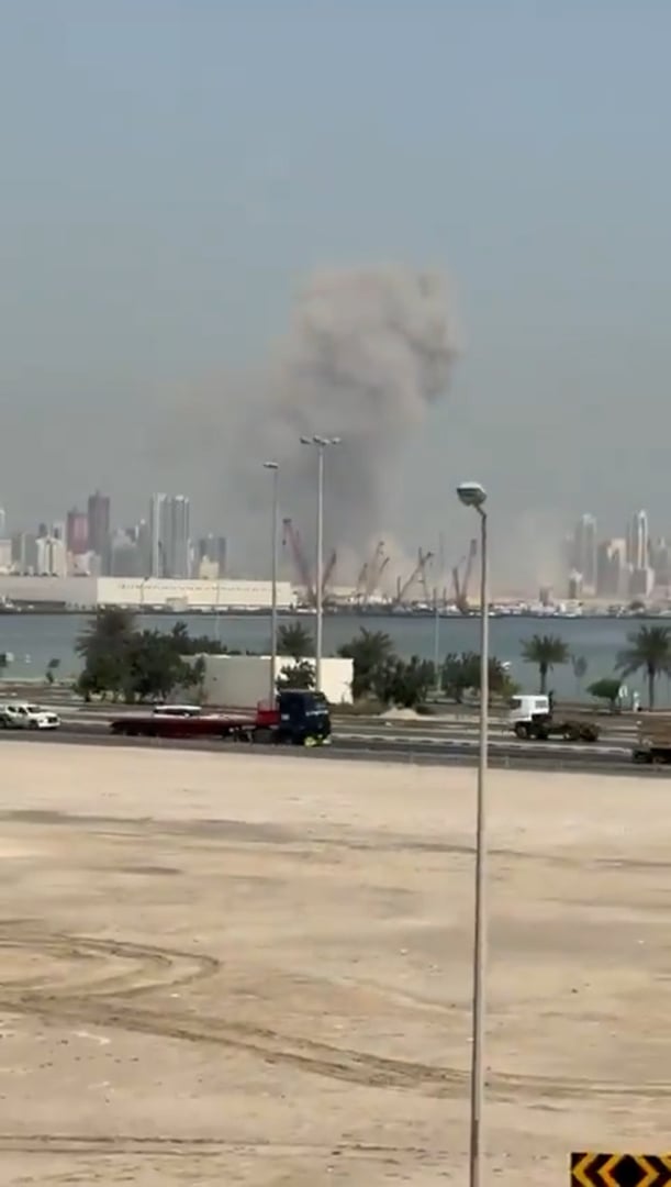 Plume of smoke rises over Bahrain after Iranian missile and drone attack on US military installation in the Gulf