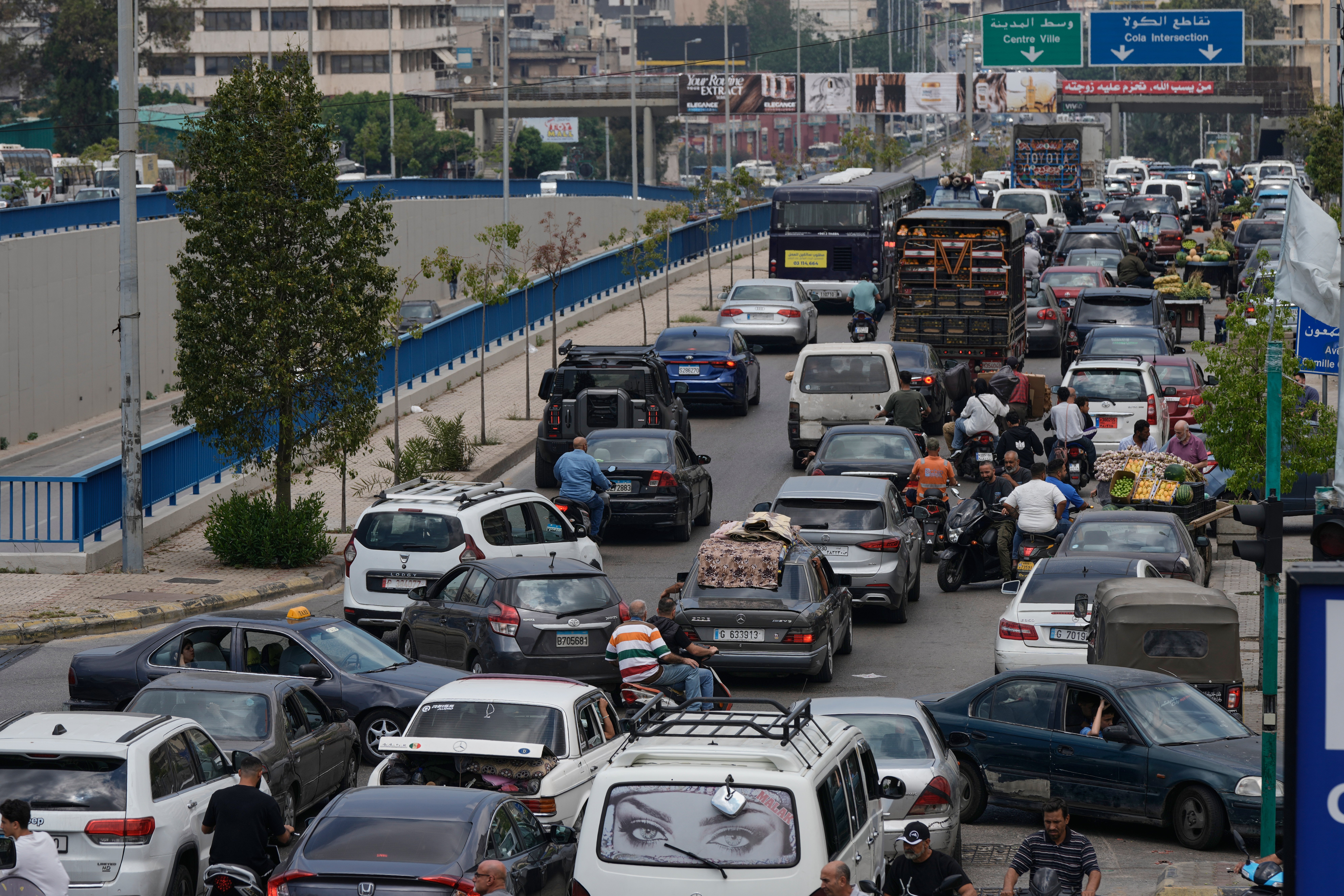 Cars in traffic on a Beirut highway as residents flee following Israeli threat to strike Dahiyeh, Lebanon, June 1, 2026