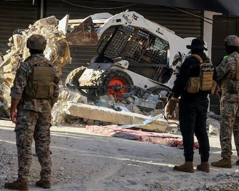 Heavy machinery removes rubble after Israeli airstrike on Beirut southern suburbs June 2026