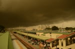 Dark monsoon rain clouds gathering over Bengaluru City railway station as the IMD issues a red alert