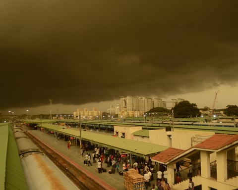 Dark monsoon rain clouds gathering over Bengaluru City railway station as the IMD issues a red alert