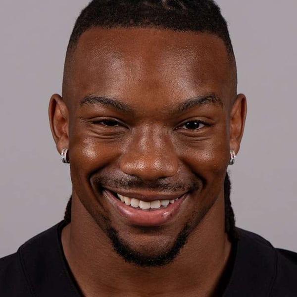 Bijan Robinson Atlanta Falcons running back poses for headshot at training facility 2025