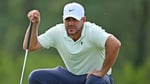Brooks Koepka lines up a putt during the first round of the RBC Canadian Open 2026 at TPC Toronto at Osprey Valley