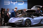 Chinese carmaker BYD displays an electric vehicle model at the Essen Motor Show in Germany