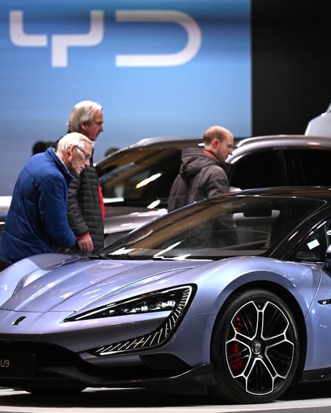 Chinese carmaker BYD displays an electric vehicle model at the Essen Motor Show in Germany