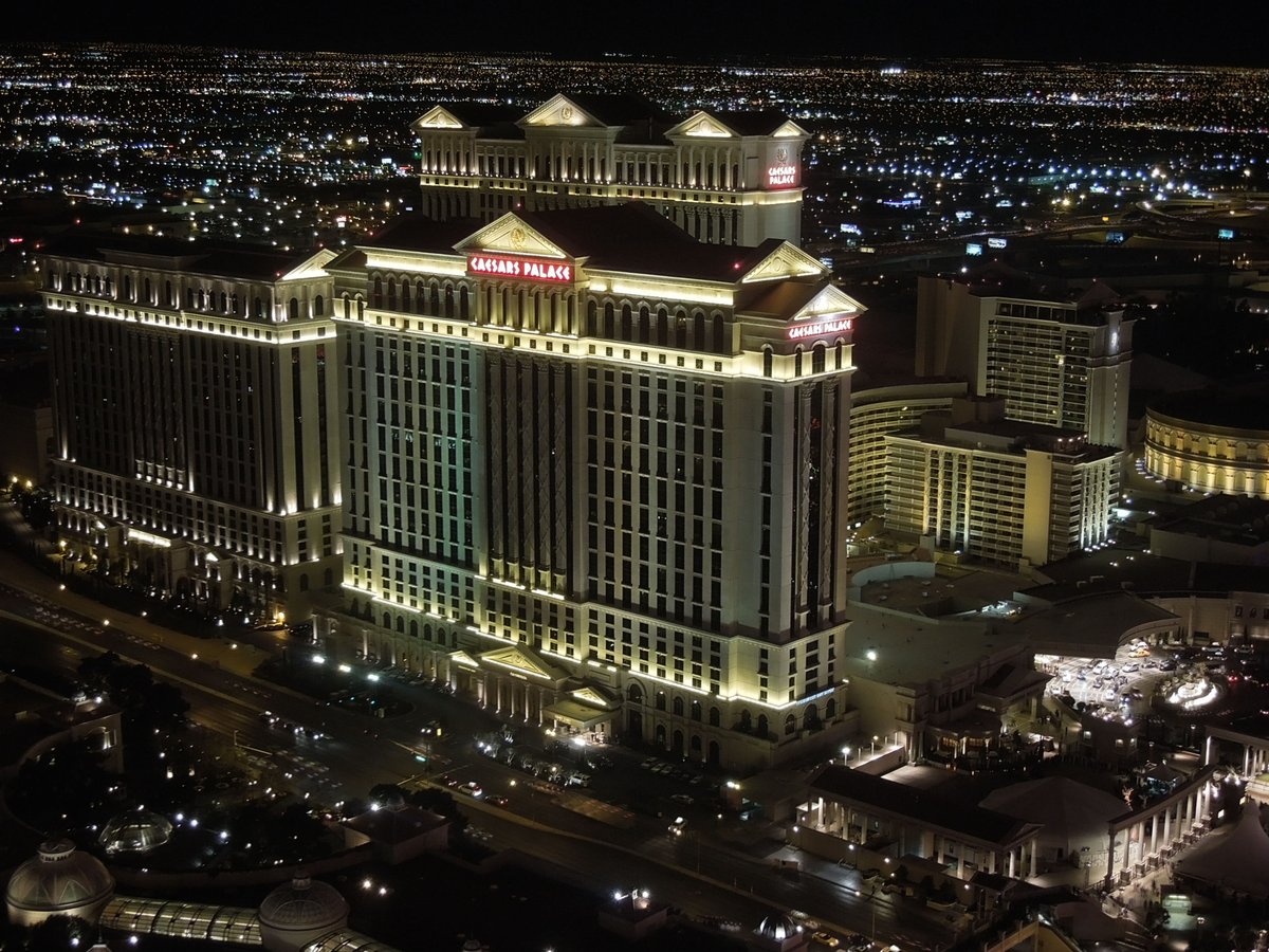 Caesars Palace hotel exterior illuminated at night in Las Vegas, Nevada