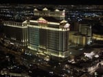 Caesars Palace hotel exterior illuminated at night in Las Vegas, Nevada