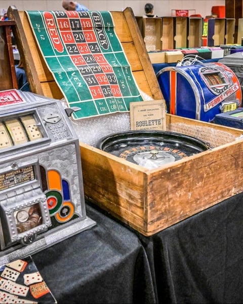 Vintage casino slot machines and memorabilia on display at the 2026 Casino Chip and Collectibles Show South Point Las Vegas
