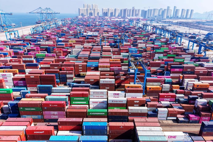 Shipping containers stacked at Qingdao port in China