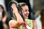 Maja Chwalinska celebrates after beating Diana Shnaider to reach the 2026 French Open final at Roland Garros