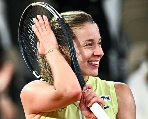 Maja Chwalinska celebrates after beating Diana Shnaider to reach the 2026 French Open final at Roland Garros