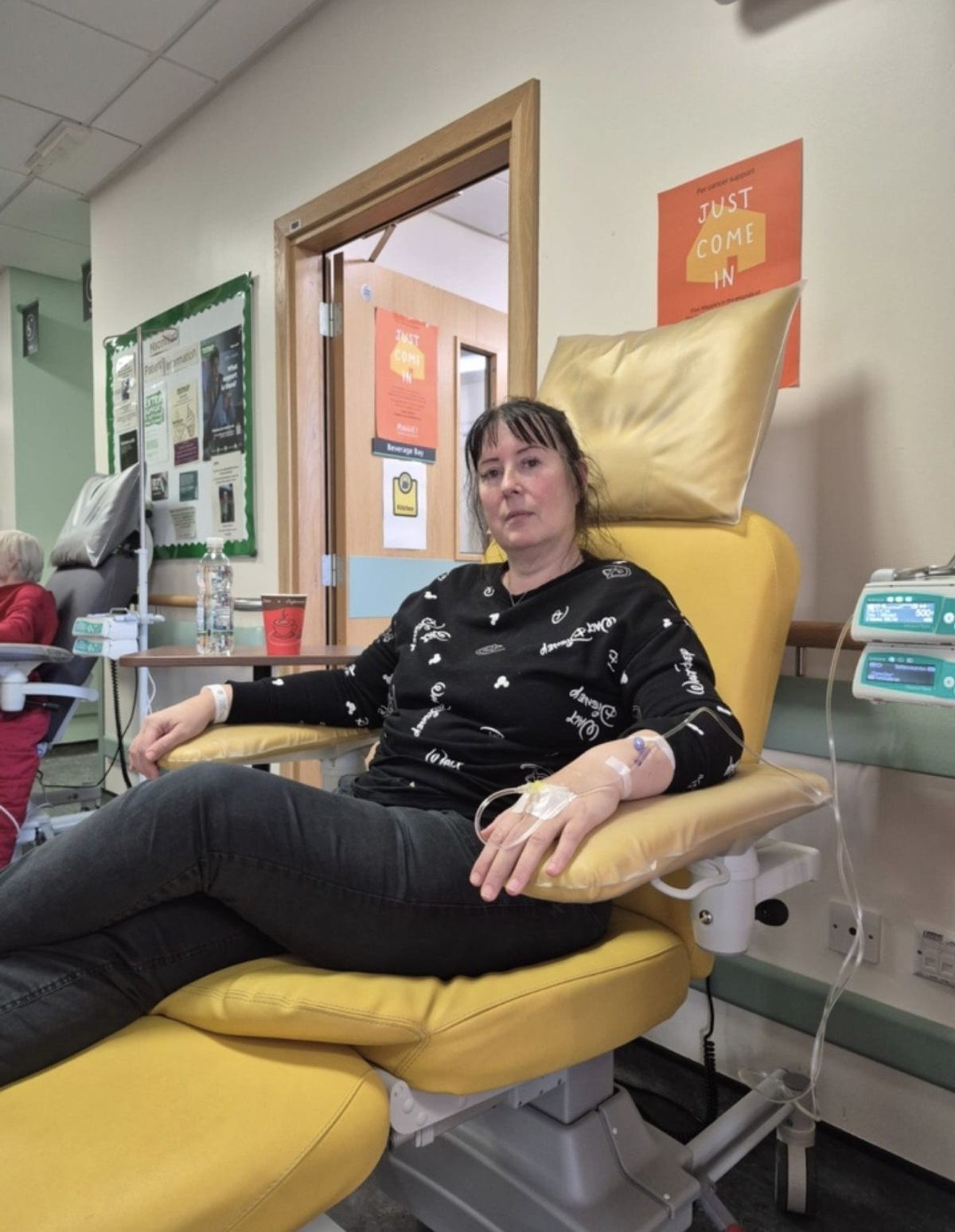 Clare Din in hospital during chemotherapy and radiation treatment for stage 4 cervical cancer