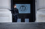 US Capitol Police officer stands guard outside the House of Representatives on Capitol Hill, Washington DC