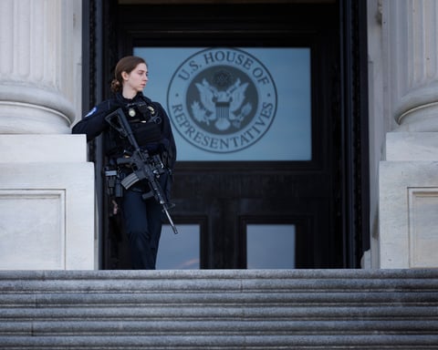 US Capitol Police officer stands guard outside the House of Representatives on Capitol Hill, Washington DC