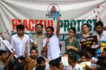 Cockroach Janta Party founder Abhijeet Dipke shouts slogans during the protest over NEET exam irregularities at Jantar Mantar in New Delhi