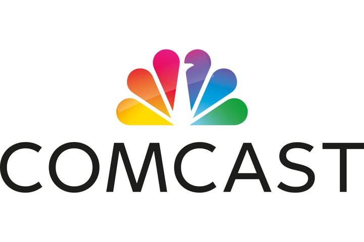 Comcast logo and NBCUniversal headquarters as company announces spinoff of media assets into separate public company June 2026