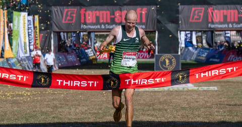 George Kusche crosses the finish line at Hollywoodbets Scottsville Racecourse to win the 2026 Comrades Marathon in Pietermaritzburg
