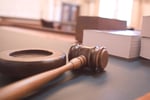 A courtroom gavel, illustrating a court ruling in the xAI OpenAI lawsuit