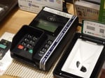 A credit card payment terminal, the point where merchants pay the interchange fees at the center of the 38 billion dollar settlement