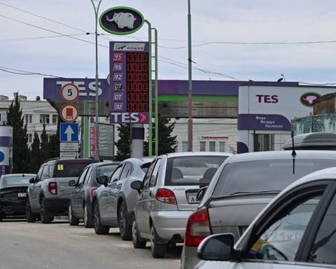 Cars queue at a gas station in Sevastopol Crimea during fuel shortage triggered by Ukrainian drone strikes on supply routes June 2026