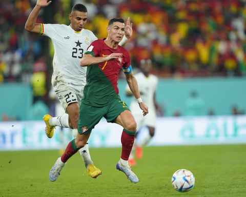 Cristiano Ronaldo celebrates after scoring his historic goal at the 2022 FIFA World Cup against Ghana, becoming the first man to score at five World Cups