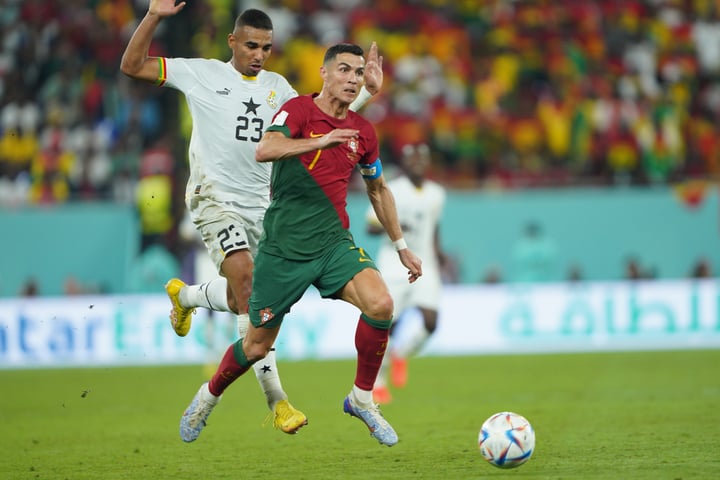 Cristiano Ronaldo celebrates after scoring his historic goal at the 2022 FIFA World Cup against Ghana, becoming the first man to score at five World Cups