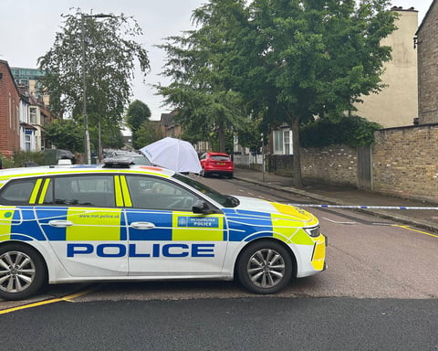 Police cordon near Dale Grove Finchley north London where 19-year-old woman was shot dead