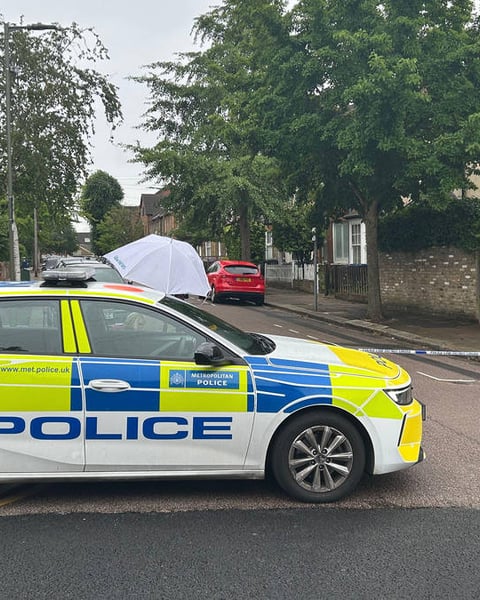Police cordon near Dale Grove Finchley north London where 19-year-old woman was shot dead