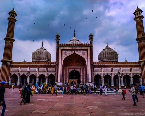Dark storm clouds massing over the Jama Masjid mosque in Delhi