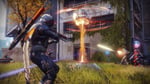 Destiny 2 players battle in a futuristic urban arena during the Monument of Triumph final update launch day