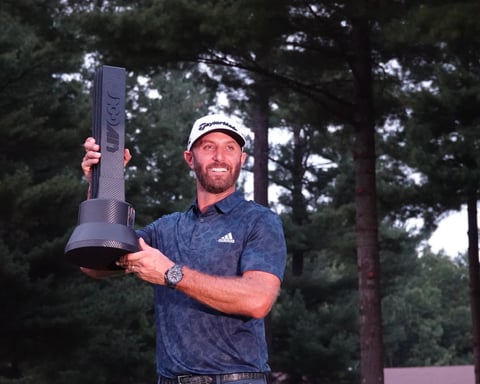 Dustin Johnson celebrating as LIV Golf Boston champion, in the league now facing the end of its Saudi funding