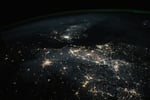 Aerial night photograph of Birmingham, United Kingdom showing the city's lights with Edgbaston Stadium district in the south, taken from the International Space Station