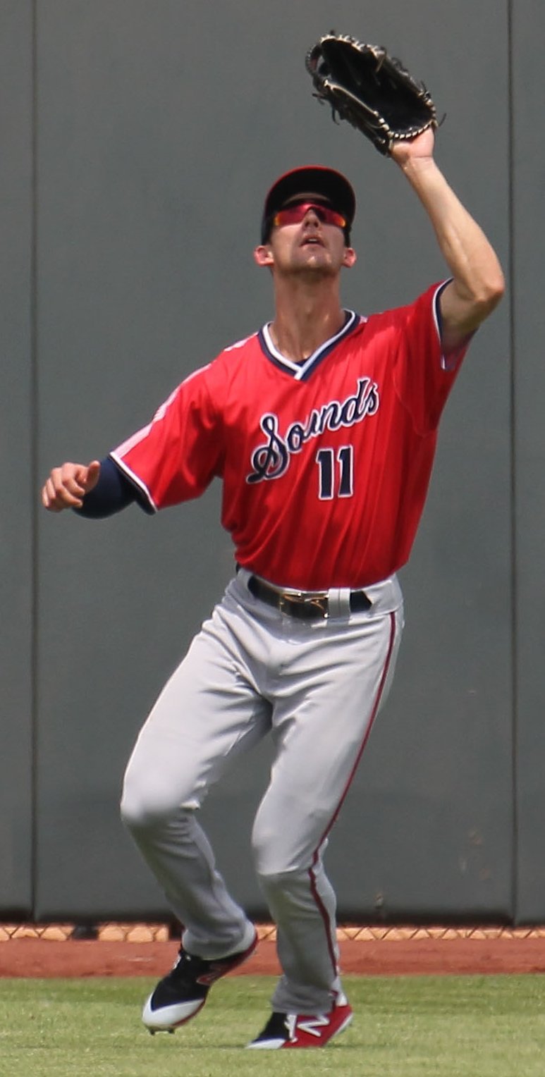 Eli White fielding in the outfield, the Braves hitter who had three hits against the Mets
