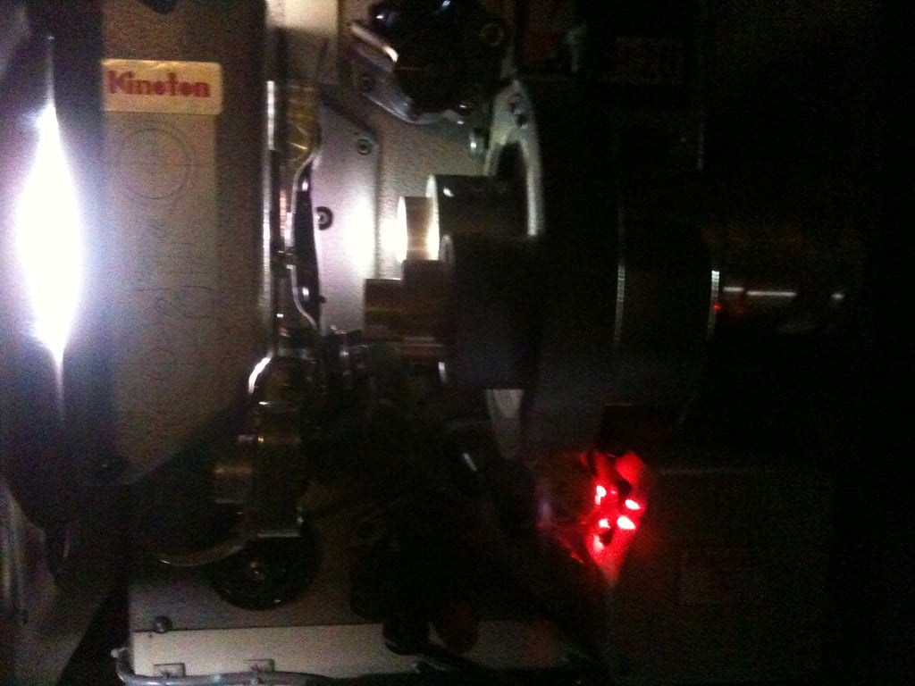 A cinema film projector, illustrating a film festival story