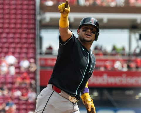 Gabriel Moreno gestures after hitting a home run in the eighth inning against the Cincinnati Reds